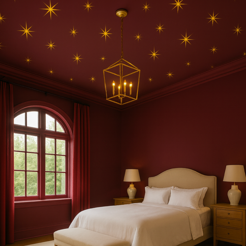 Luxurious bedroom with star-patterned ceiling, bed, and lamps.